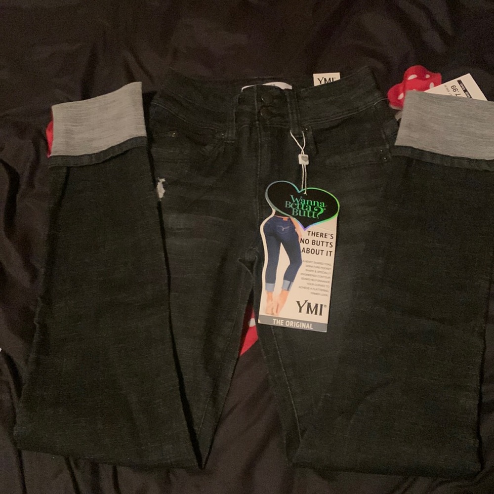 Brand new black ripped jeans.